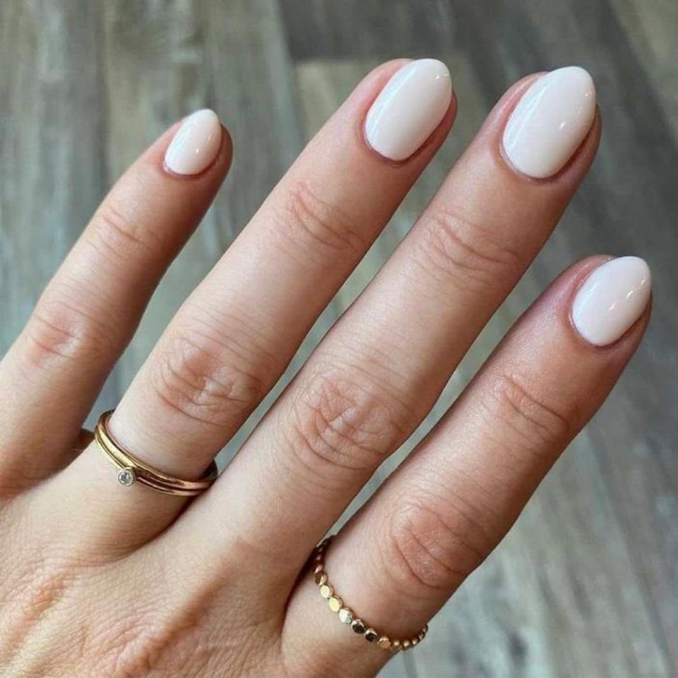 modelones front packaging of white press-on nails showing complete kit and convenience