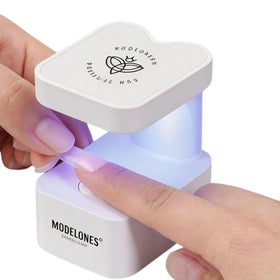 modelones front view compact UV lamp showing portable curing benefit