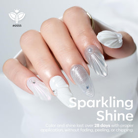 modelones magnet held over cured gel creating cat-eye stripe for design control