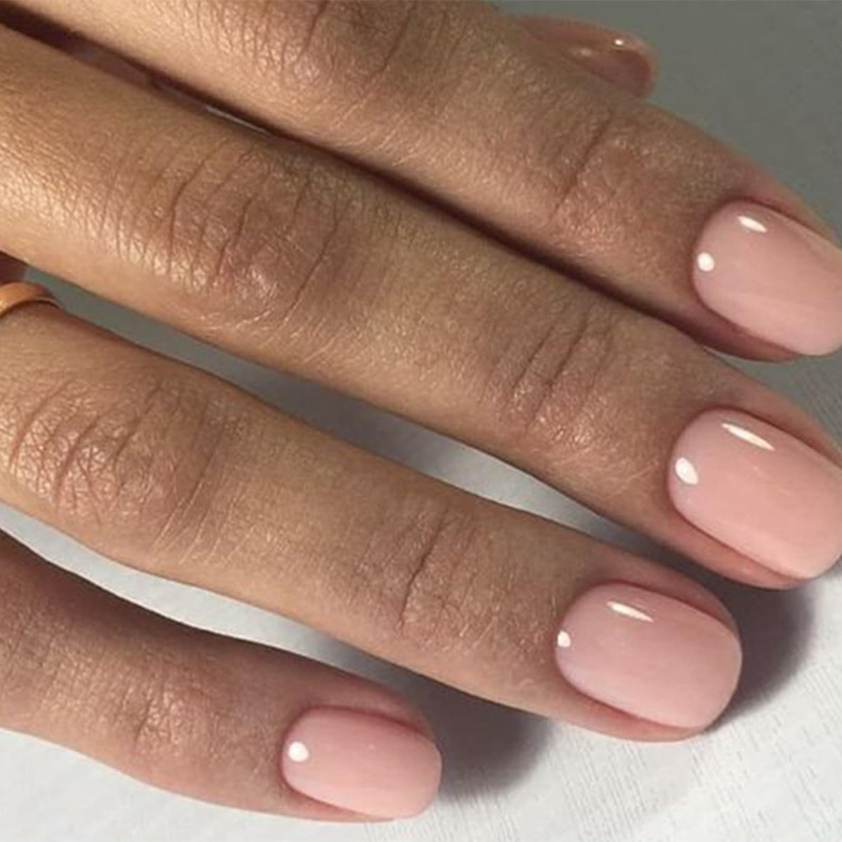 modelones pressed-on nails displayed on hand showing natural look and confidence benefit