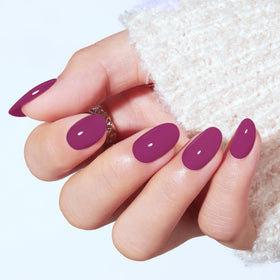modelones plum close-up of nail surface highlighting smooth durable finish