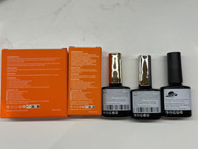 modelones bottle beside a coin to show 15ml size and portability