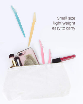 Assorted multicolor MoHern razors laid out to show variety and disposable convenience