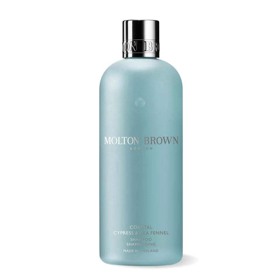 Molton Brown front bottle showing coastal cypress sea fennel scent and refreshing benefit