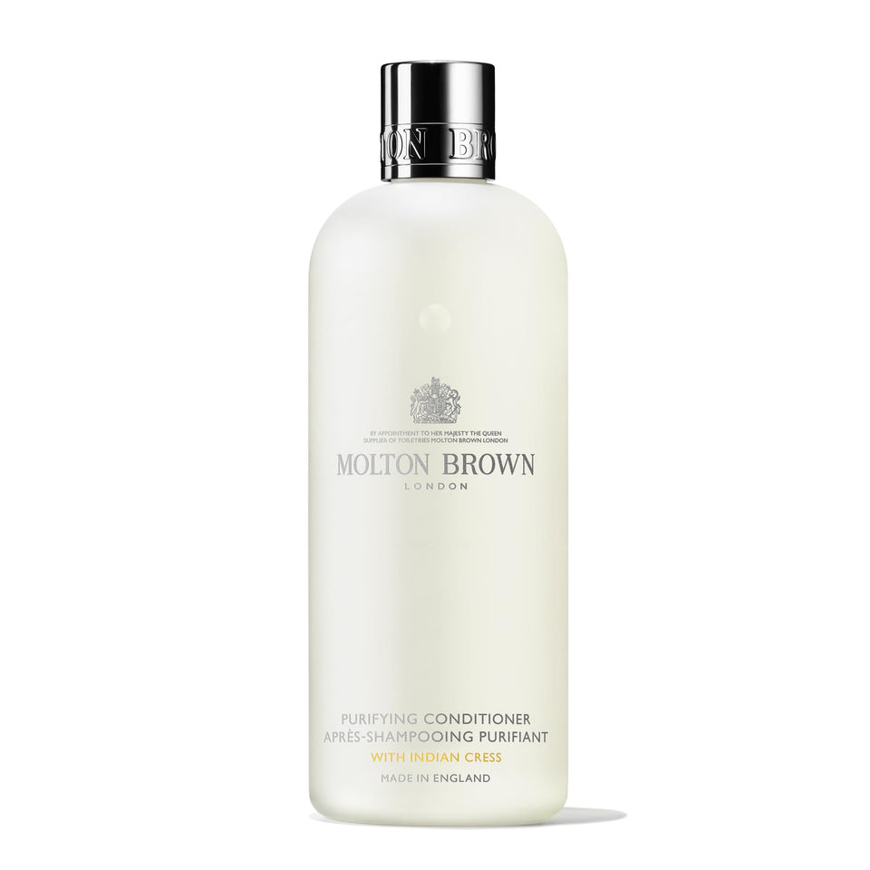 Molton Brown conditioner front packaging showing 10 fl. oz and elegant label for premium presentation