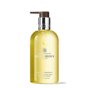 Molton Brown front bottle view showing orange bergamot fragrance and elegant packaging benefit