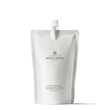 Molton Brown front packaging of Orange & Bergamot refill showing citrus branding and reduced plastic benefit