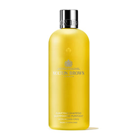 Molton Brown front bottle view showing brand and elegant packaging for premium appeal