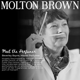 Molton Brown hand wash lather on hands showing gentle cleanse and fragrant citrus uplift