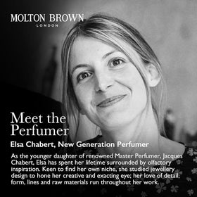 Molton Brown body wash in shower with water, showing refreshing use