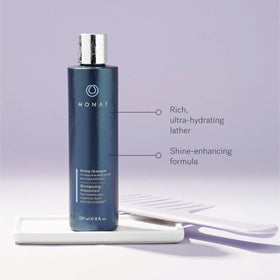 MONAT Renew bottle with key ingredient visuals showing nourishing blend
