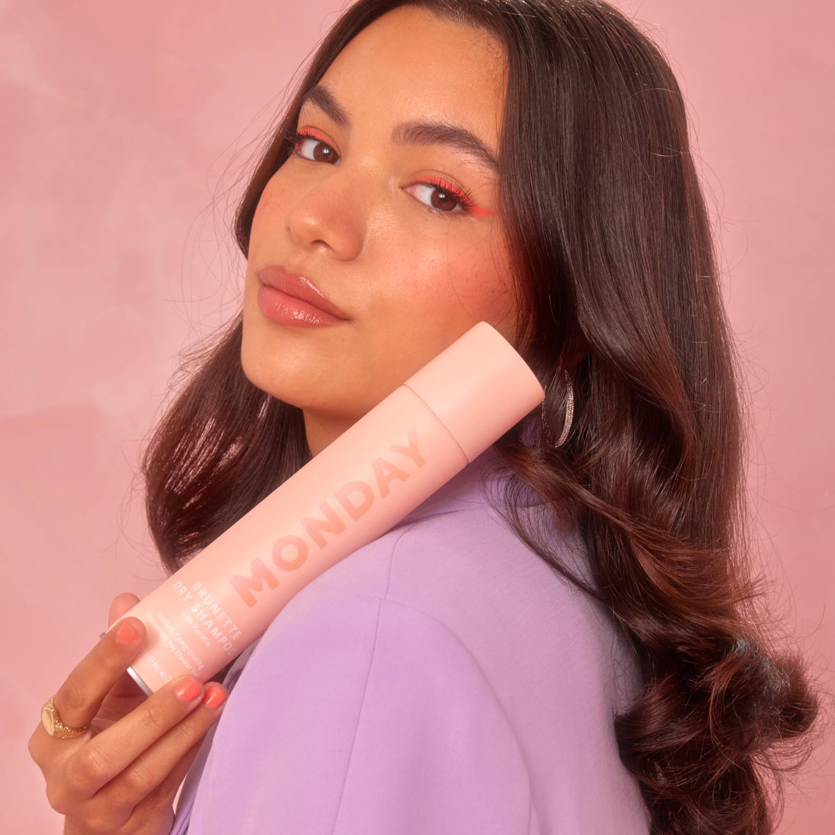 MONDAY HAIRCARE BRUNETTE next to ruler showing 200 mL size for travel convenience
