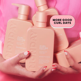 MONDAY HAIRCARE in-shower use on wet curls demonstrating detangling and slip during rinse