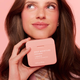 MONDAY HAIRCARE lifestyle shot of woman with glossy hair showing visible results