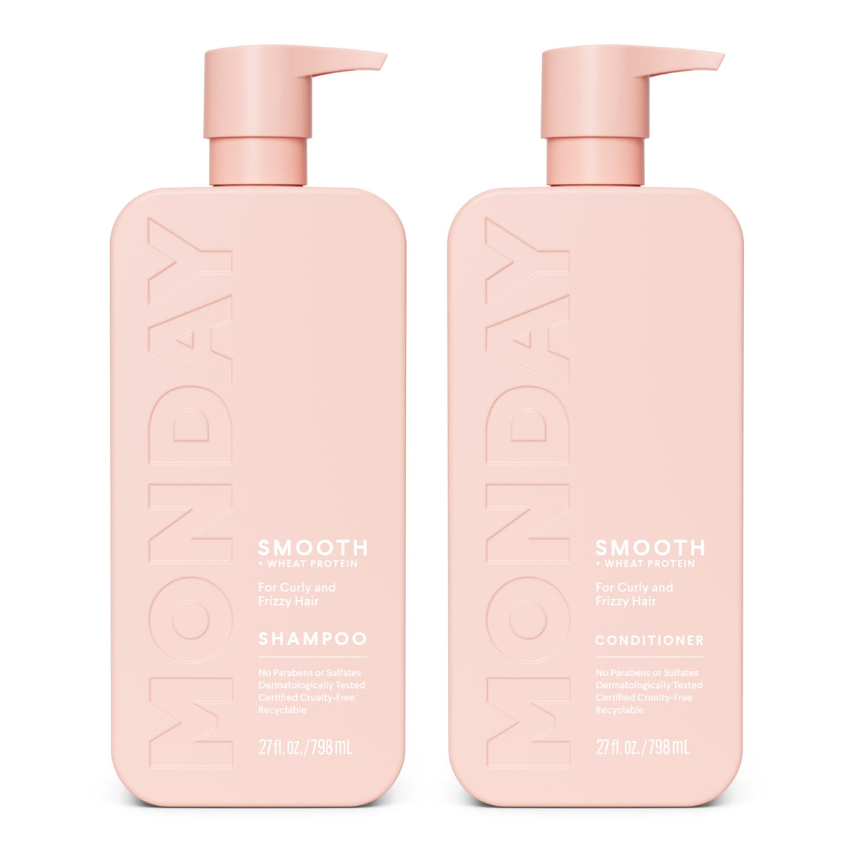 MONDAY HAIRCARE front packaging showing pink 27 oz bottles and benefits