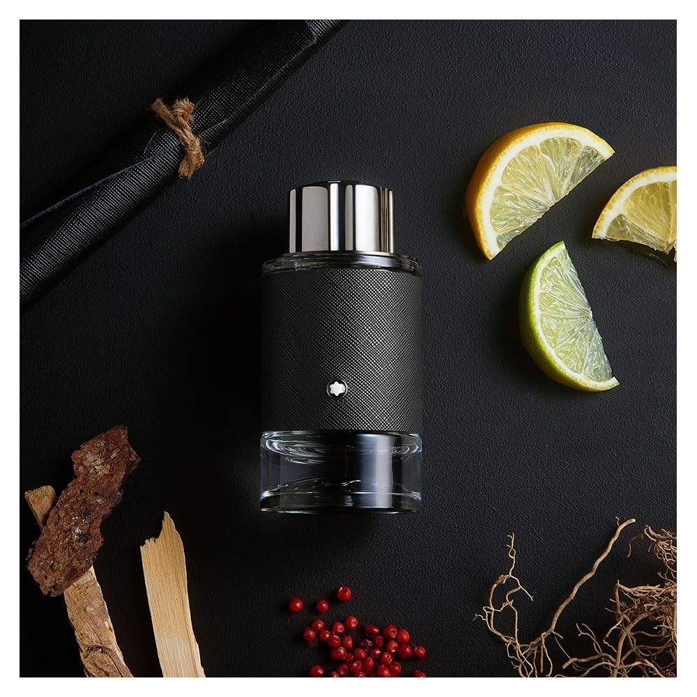 Hand spraying Montblanc Explorer to show mist and effortless application benefit