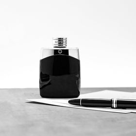 MONTBLANC Legend held in hand to show 3.3 fl oz scale and practical daily use