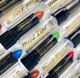 Mood Lips worn by model outdoors illustrating durable color under sunlight