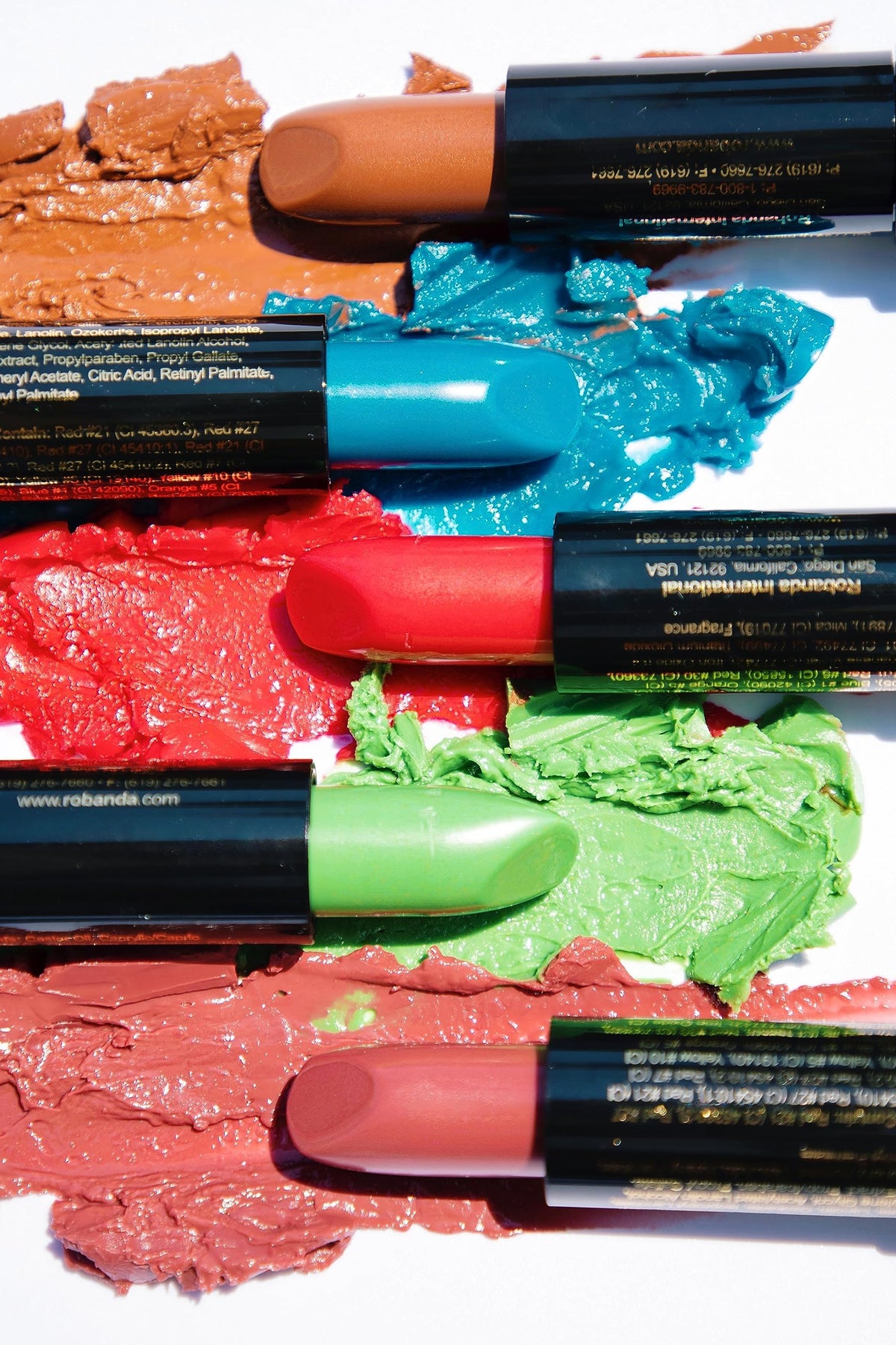 Mood Lips next to ruler showing compact size and travel-friendly convenience