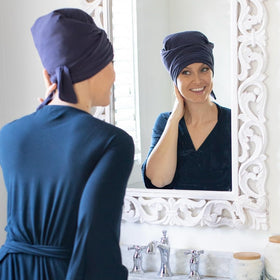 MoonstoneSeven model wearing plop in bathroom showing comfortable styling prep