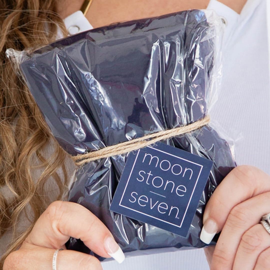 MoonstoneSeven next to towel size comparison highlighting compact, travel friendly design