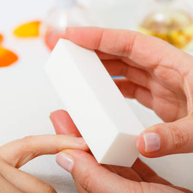 Morary buffer polishing a natural nail to smooth surface