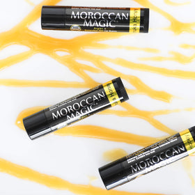 Moroccan Magic balm on bedside table showing nighttime hydration routine