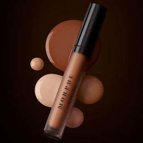 Using Morphe concealer to contour and highlight cheek demonstrating sculpting versatility
