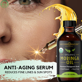 Mother Nature Organics dropper pouring moringa oil showing smooth application benefit