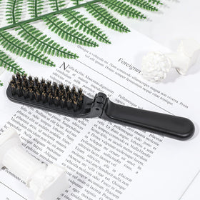 Mozeat Lens unfolded brush held in hand showing full-length grip for quick styling