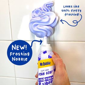 Child spraying Mr. Bubble foam on arm demonstrating independent washing benefit
