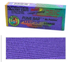 Using Mr. Pumice purple PUMI Bar on feet during a pedicure to smooth heels and calluses