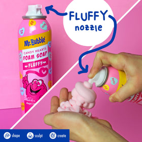 Child drawing in bath with Mr. Bubble foam demonstrating independent washing and playful learning