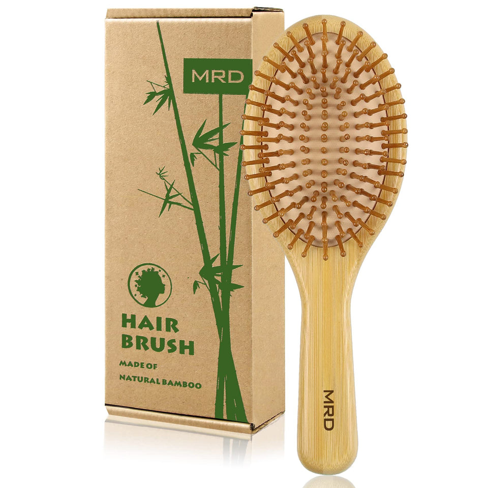 MRD bamboo paddle brush front view showing full paddle and bristles, eco-friendly benefit