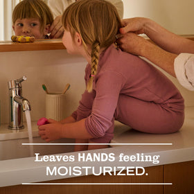 Mrs. MEYER'S refill being poured into a dispenser to refill multiple bottles efficiently