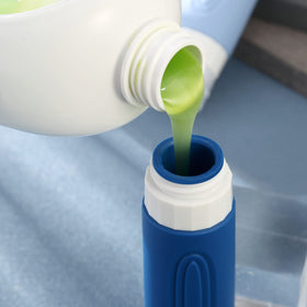 Mrsdry cap detail with no-drip valve for spill-free dispensing