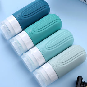 Mrsdry clear pouch unzipped with bottles neatly stored for organized packing