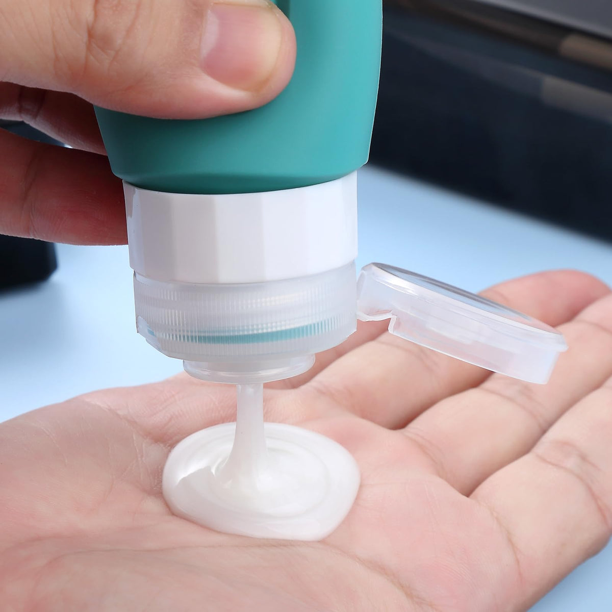 Mrsdry flexible silicone being squeezed to show last-drop dispensing benefit