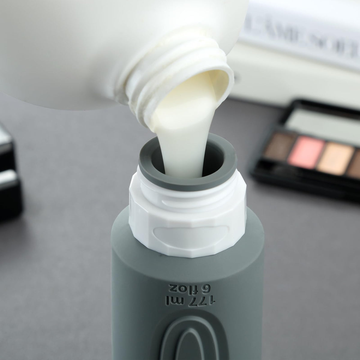 Mrsdry textured grip on bottle body improving handling and controlled squeeze