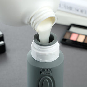 Mrsdry textured grip on bottle body improving handling and controlled squeeze