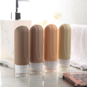 Mrsdry bottles packed in a travel toiletry bag lifestyle shot showing organized carry-on benefit neat storage