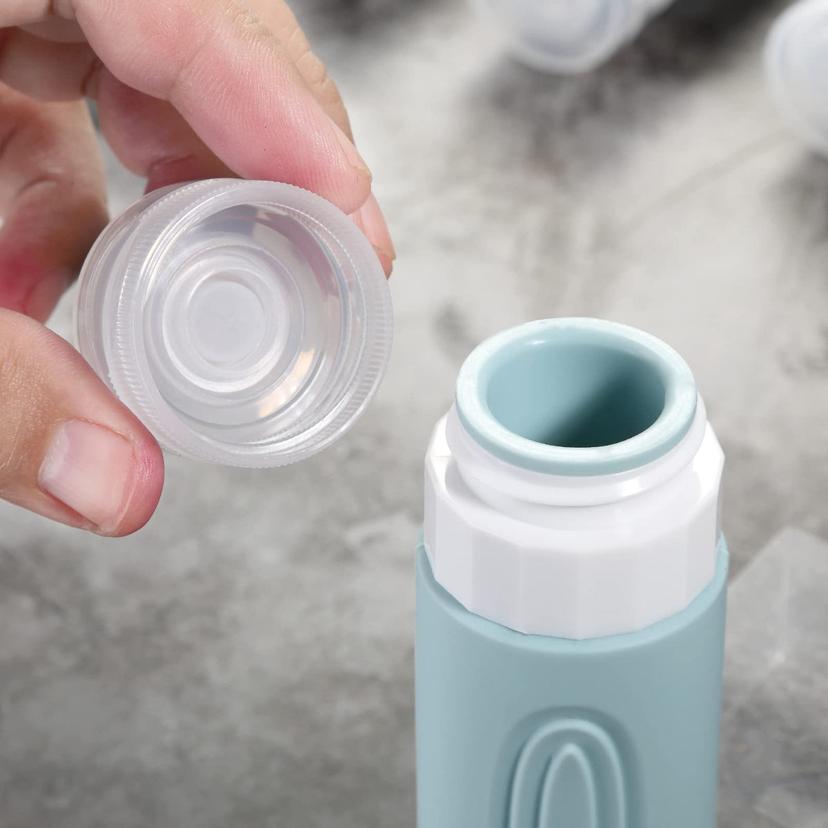 Mrsdry wide mouth being filled with lotion demonstrating easy refilling benefit