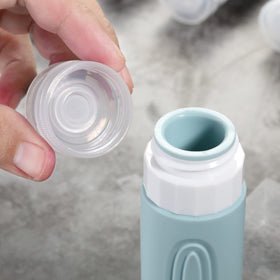 Mrsdry wide mouth being filled with lotion demonstrating easy refilling benefit