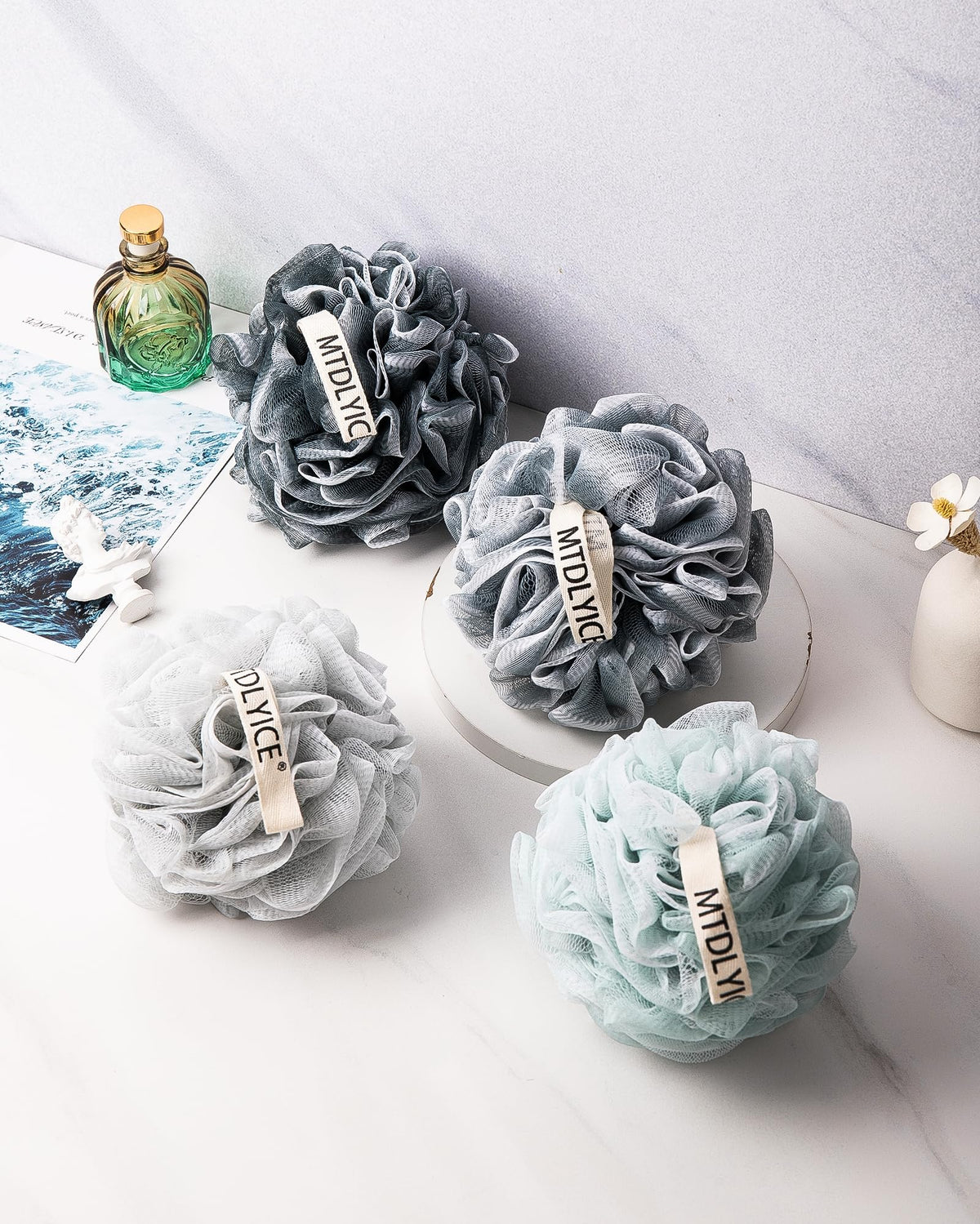 MTDLYICE lifestyle shot of stacked sponges in modern bathroom