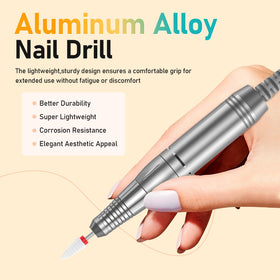 mUGLE handpiece beside a hand to show compact size and travel convenience