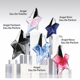 Woman wearing Mugler Angel at evening event showing confidence and lasting trail benefit: memorable scent