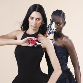 Mugler Angel Nova scale comparison in hand illustrating the travel size