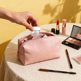 MUIIGOOD jars in travel pouch showing organized toiletries for trips