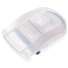 MUJI portable eyelash curler in hand scale demonstrating pocket-friendly size and easy grip