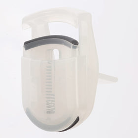 MUJI portable eyelash curler slide-closed detail protecting the curling head for travel
